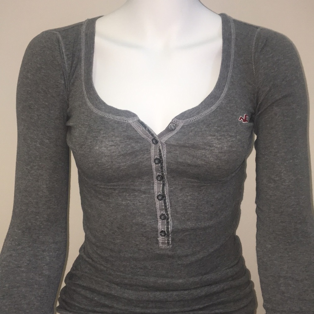 Long sleeve, fitted, v-cut button down shirt